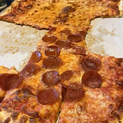 Paradise Pizza and Grill - Party pizza - missing a few slices