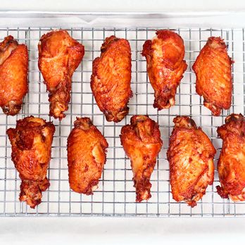 Rebel Wings - chicken wings on a cooling rack - Food Delivery Services Near Me - Seattle, Washington Rebel Wings - chicken wings on a cooling rack - Food Delivery Services Near Me - Seattle, Washington
