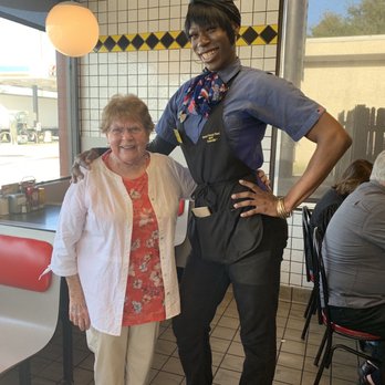 Waffle House - My 88 year old Aunt Dora and Ms. Porsha. We love Ms. Porsha with a side of hash browns scattered and covered. - Breakfast & Brunch Near Me - Davenport, Florida