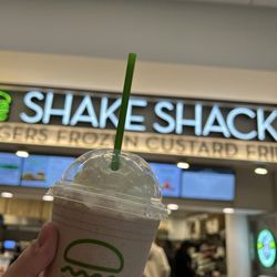 Shake Shack - Black and white shake with whipped cream and cookies.