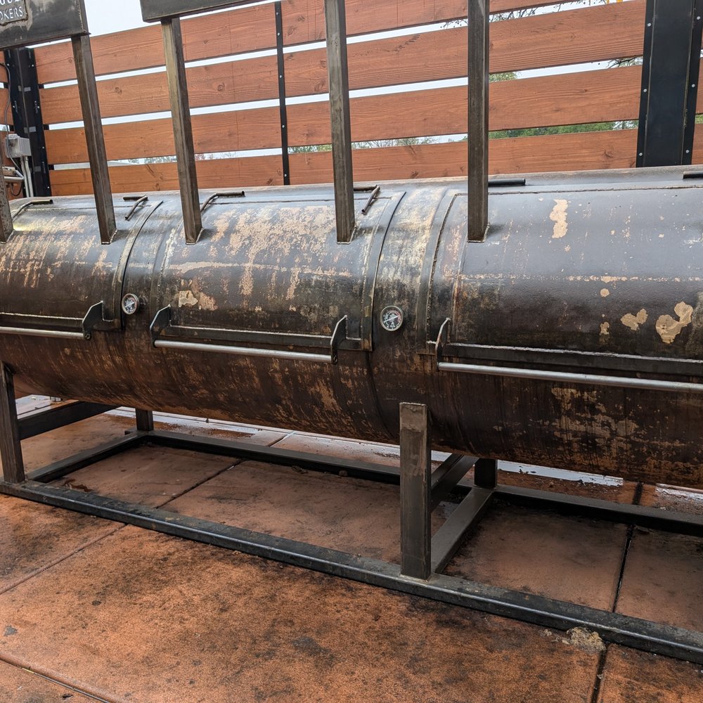 Belly Barbecue - One of the several gigantic smokers behind Belly. - Barbeque Near Me - Folsom, California Belly Barbecue - One of the several gigantic smokers behind Belly. - Barbeque Near Me - Folsom, California
