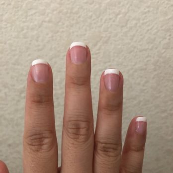 Happiness Nails - Uneven French tips, some are straight others are curved - Nail Salons Near Me - Elk Grove, California Happiness Nails - Uneven French tips, some are straight others are curved - Nail Salons Near Me - Elk Grove, California