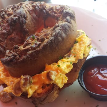 Oliver's Bistro - Hearty #breakfast before church. Popover stuffed w/ egg, bacon, sausage & cheese. Yum! #Brunch #Southbeach - Breakfast & Brunch Near Me - Miami Beach, Florida Oliver's Bistro - Hearty #breakfast before church. Popover stuffed w/ egg, bacon, sausage & cheese. Yum! #Brunch #Southbeach - Breakfast & Brunch Near Me - Miami Beach, Florida