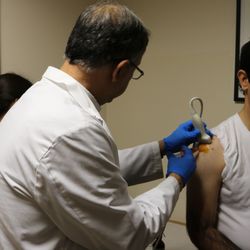 Coast Spine Sports Medicine - Dr. Moheimani performing a PRP injection to the shoulder. PRP therapy is a form of regenerative medicine that uses the person's own blood.