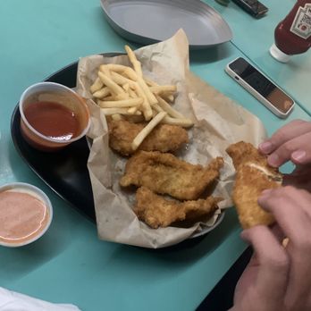 Surf Club Cantina - Another shot of the chicken tenders and fries. Very good. - Restaurants Near Me - St John, Virgin Islands Surf Club Cantina - Another shot of the chicken tenders and fries. Very good. - Restaurants Near Me - St John, Virgin Islands