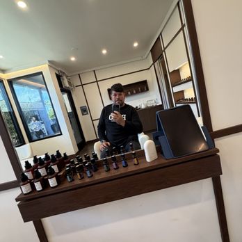 Biva Hair Sanctuary - In the chair with all the essential oils to pick from for one's treatment. - Hair Extensions Near Me - Burbank, California