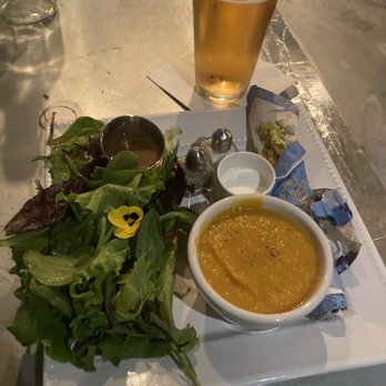 Tighe's Bistro Americain - Warm Carrot soup served with cream on side and salad with basalmic vinegaret - French Near Me - Averill Park, New York