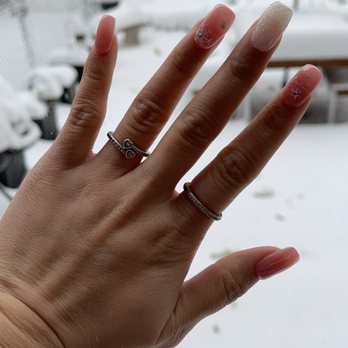 Modern Spa - Acrylic gel design with pink, white glitter, stones, and snow flakes matching the snow outside - Nail Salons Near Me - New York, New York Modern Spa - Acrylic gel design with pink, white glitter, stones, and snow flakes matching the snow outside - Nail Salons Near Me - New York, New York