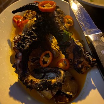 Tavern On State - Grilled octopus with an addicting chili butter and the crispiest fingerlings!!!! - American Near Me - New Haven, Connecticut Tavern On State - Grilled octopus with an addicting chili butter and the crispiest fingerlings!!!! - American Near Me - New Haven, Connecticut