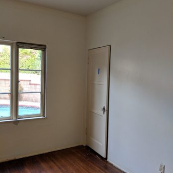 KM Custom Flooring - Guest Room: Before - Flooring Near Me