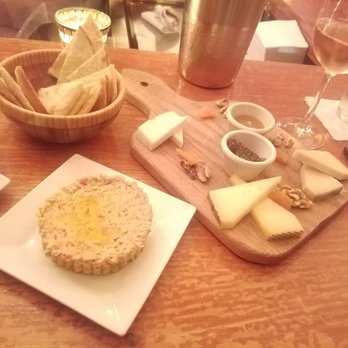 Wine Escape - Bowl of pita(top), babaganoush, cheese plate (right). - Wine Bars Near Me - New York, New York Wine Escape - Bowl of pita(top), babaganoush, cheese plate (right). - Wine Bars Near Me - New York, New York