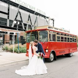 Rare Transportation - Newlyweds in front of Regions Field with the Antique Trolley
