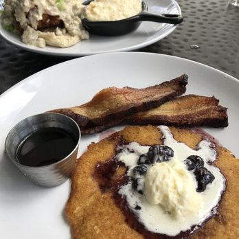 Grace & Grit - Southern fried chicken biscuit and a la cart johnny cake and bacon. - Southern Near Me - Mount Pleasant, South Carolina