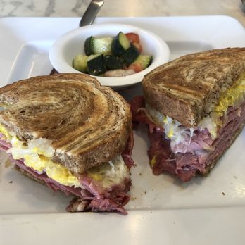 McAlister's Deli - Reuben with a cucumber and tomato salad. - Sandwiches Near Me - Plano, Texas McAlister's Deli - Reuben with a cucumber and tomato salad. - Sandwiches Near Me - Plano, Texas