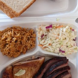 Fantastic chicken and brisket with jambalaya and coleslaw to go