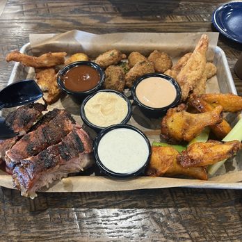Famous Dave's Bar-B-Que - Signature Sampler Platter Appetizer Traditional Wings - Barbeque Near Me - Chandler, Arizona Famous Dave's Bar-B-Que - Signature Sampler Platter Appetizer Traditional Wings - Barbeque Near Me - Chandler, Arizona
