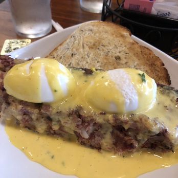 Honeycomb Cafe - Corned beef hash with poached eggs and hollandaise sauce! - New American Near Me - Belmont, North Carolina