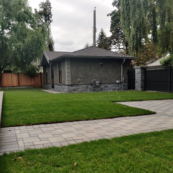 Able Boys Landscaping - a backyard with a brick paver - Landscaping Near Me Able Boys Landscaping - a backyard with a brick paver - Landscaping Near Me