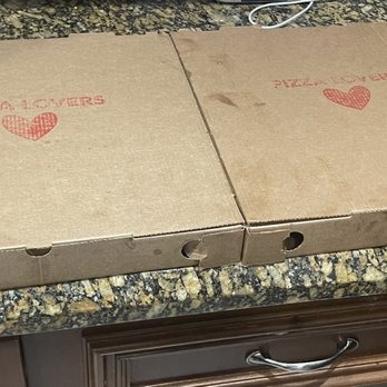 Pizza Lovers Bistro - two pizza boxes on a counter - Pizza Near Me - Plantation, Florida Pizza Lovers Bistro - two pizza boxes on a counter - Pizza Near Me - Plantation, Florida