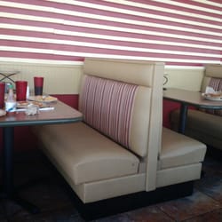 Godfather's Pizza - 10 tables not cleaned off..
