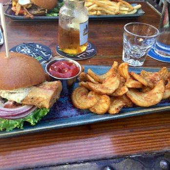 Biergarden Encinitas - Fish burger lacked flavor I wouldn't recommend. These curled fries (wedge fries? Not sure lol) where yummy though! - New American Near Me - Encinitas, California Biergarden Encinitas - Fish burger lacked flavor I wouldn't recommend. These curled fries (wedge fries? Not sure lol) where yummy though! - New American Near Me - Encinitas, California