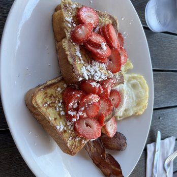 Kihei Caffe Lahaina - French toast with fresh strawberries , eggs and bacon  (the bacon was so good, we ordered more to go) - Breakfast & Brunch Near Me - Lahaina, Hawaii