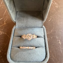 Kubes Jewelers - Top view of 3-stone engagement ring and wedding band