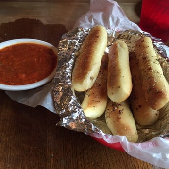 Star Pizza - Breadsticks and marinara sauce - Pizza Near Me - Houston, Texas