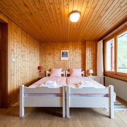 Berghaus Toni - A double bedroom with en-suite bathroom and balcony