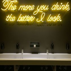 Headflyer Brewing - Communial bathroom sink and awesome neon sign