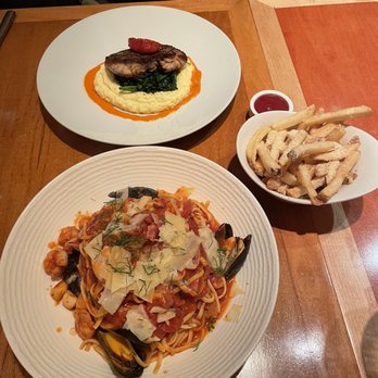 Ostra - Pasta Del Mar, parmesan truffle fries, red snapper - New American Near Me - San Antonio, Texas
