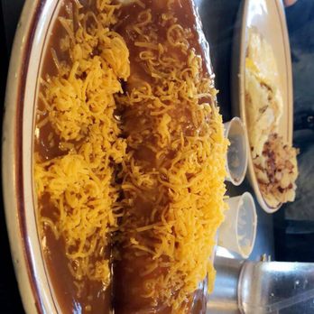 Pete's Kitchen - Breakfast burrito covered in gravy and topped with cheese - Greek Near Me - Denver, Colorado Pete's Kitchen - Breakfast burrito covered in gravy and topped with cheese - Greek Near Me - Denver, Colorado