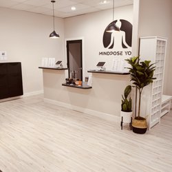 Mindpose Yoga - Front desk with iPad kiosk check in stations