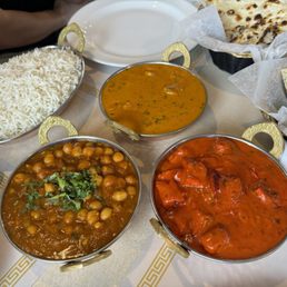 Chana Masala (left), butter chicken (top), chicken Tikka (right)