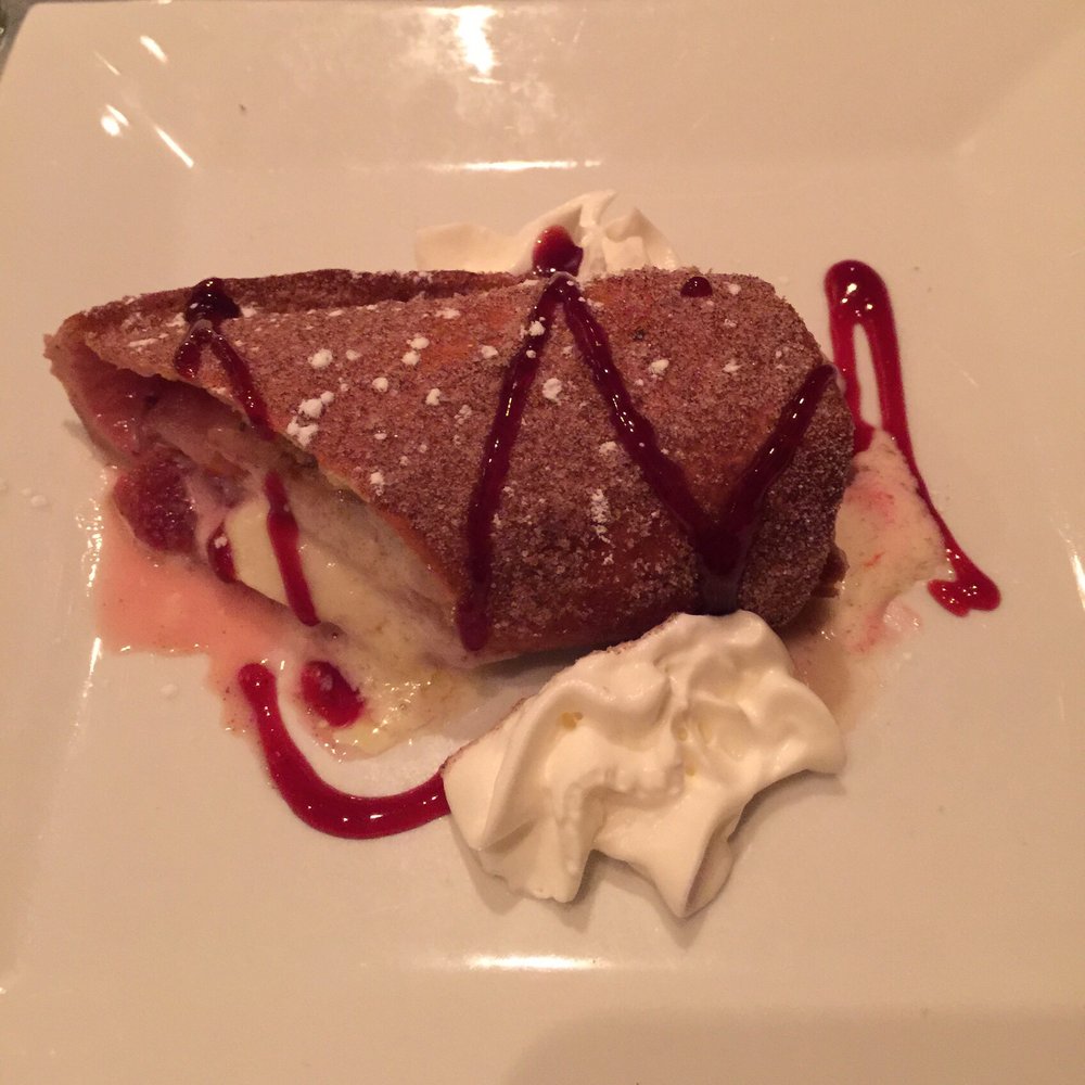 Bistro 1051 - Half of the deep-fried cheesecake dessert. Crunchy AND creamy. Yumzilla! - Italian Near Me - Clark, New Jersey Bistro 1051 - Half of the deep-fried cheesecake dessert. Crunchy AND creamy. Yumzilla! - Italian Near Me - Clark, New Jersey