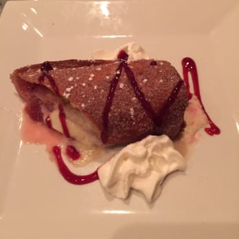 Bistro 1051 - Half of the deep-fried cheesecake dessert. Crunchy AND creamy. Yumzilla! - Italian Near Me - Clark, New Jersey Bistro 1051 - Half of the deep-fried cheesecake dessert. Crunchy AND creamy. Yumzilla! - Italian Near Me - Clark, New Jersey