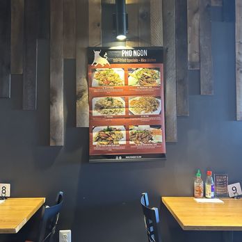 Pho Ngon - two tables and a menu on the wall - Vietnamese Near Me - Norristown, Pennsylvania