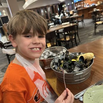 Phillips Seafood - Steamed mussels with potato sausage and corn on the cob was a big hit for this kid - Seafood Near Me - Baltimore, Maryland Phillips Seafood - Steamed mussels with potato sausage and corn on the cob was a big hit for this kid - Seafood Near Me - Baltimore, Maryland