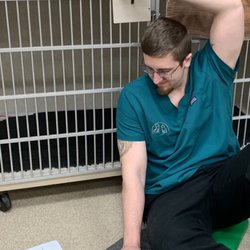 Noah's Landing Pet Care Clinic - Multitasking sending love out in multiple directions is one of the things our techs do best!