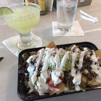 La Chula - a plate of nachos and a drink - Mexican Near Me - East Elmhurst, New York