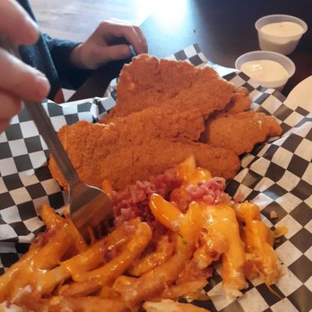 Penny's Pit - Chicken strips with Ryan's fries - Pubs Near Me - Rathdrum, Idaho Penny's Pit - Chicken strips with Ryan's fries - Pubs Near Me - Rathdrum, Idaho