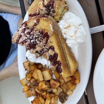 SunnySide Cafe - French toast with some whip cream on our potatoes. Good job, Mark. - Breakfast & Brunch Near Me - Clemson, South Carolina SunnySide Cafe - French toast with some whip cream on our potatoes. Good job, Mark. - Breakfast & Brunch Near Me - Clemson, South Carolina