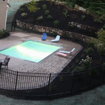 The Natural Landscape - Fieldstone walls and steps; gunite pool; concrete coping and pavers; aluminum fence, landscape plantings - Landscaping Near Me - Northborough, Massachusetts The Natural Landscape - Fieldstone walls and steps; gunite pool; concrete coping and pavers; aluminum fence, landscape plantings - Landscaping Near Me - Northborough, Massachusetts