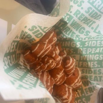 Wingstop - Chicken wings - mild sauce with drizzled ranch - Chicken Wings Near Me - Scottsdale, Arizona