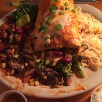 Moab Brewery - Veggie burrito cut open cuz I already started eating it cuz it is awesome! - American Near Me - Moab, Utah Moab Brewery - Veggie burrito cut open cuz I already started eating it cuz it is awesome! - American Near Me - Moab, Utah