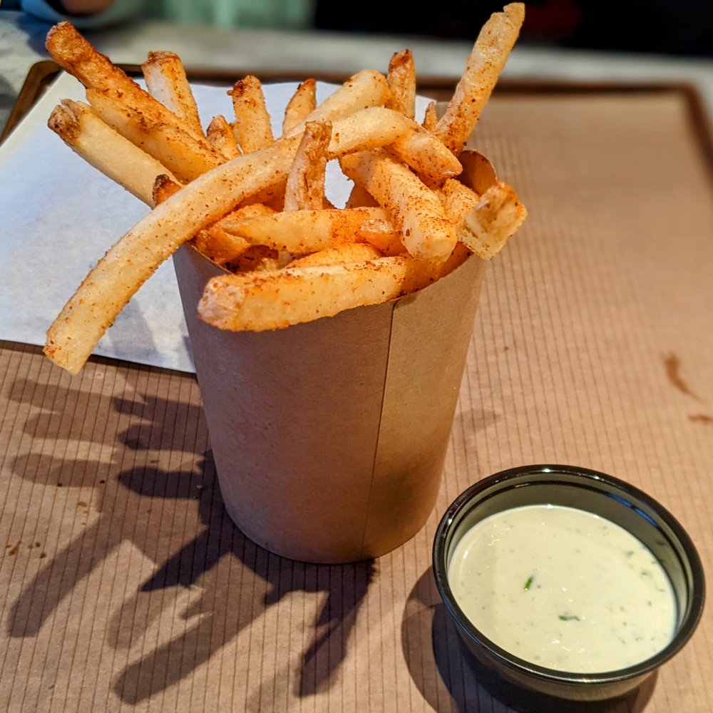 Brassica - Fries with a side of tahini sauce. - Mediterranean Near Me - Columbus, Ohio Brassica - Fries with a side of tahini sauce. - Mediterranean Near Me - Columbus, Ohio