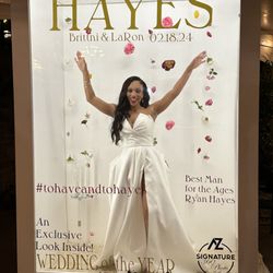 AZ Signature 360 Photo Booth - Beautiful Bride Brittini enjoying our Magazine Booth.