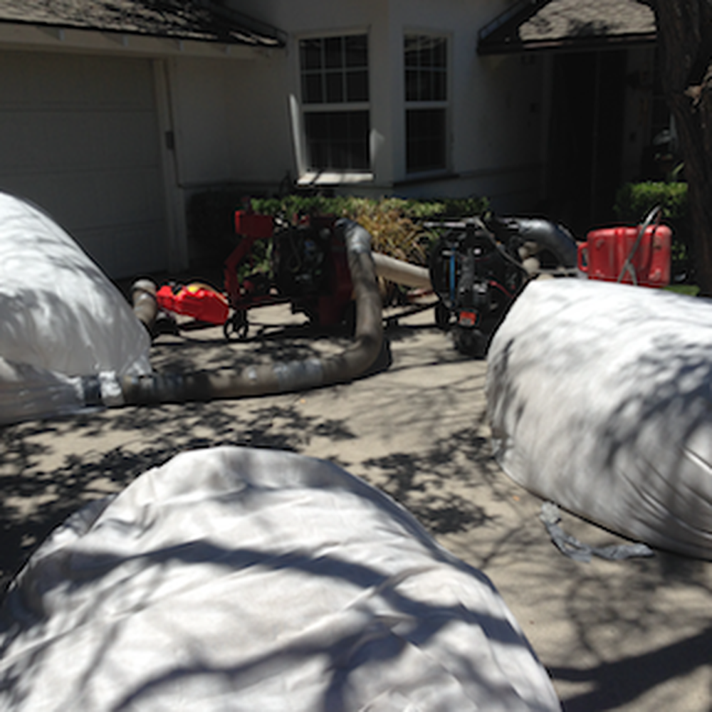 Atticare - Back side of the two vacuums used in cleaning your attic - Insulation Installation Near Me - Burbank, California Atticare - Back side of the two vacuums used in cleaning your attic - Insulation Installation Near Me - Burbank, California