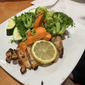Sizzler - my son's Italian Herb Chicken and raw veggies. - Seafood Near Me - Los Angeles, California