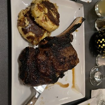 Webb Custom Kitchen - Bone-In Aged Cowboy Ribeye w/ country potato cakes - New American Near Me - Gastonia, North Carolina